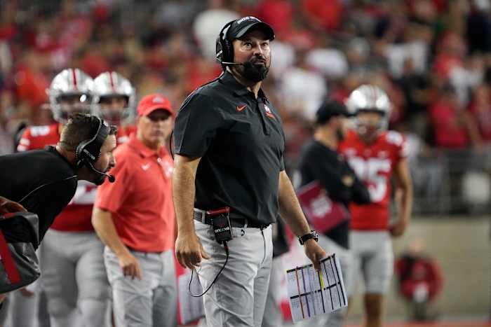 Ohio State Buckeyes head coach Ryan Day looks to the scoreboard during the second quarter of the NCAA football game against the Notre Dame Fighting Irish at Ohio Stadium.